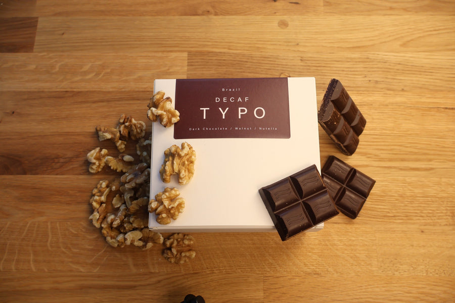 Decaf coffee box with dark chocolate and walnut tasting notes