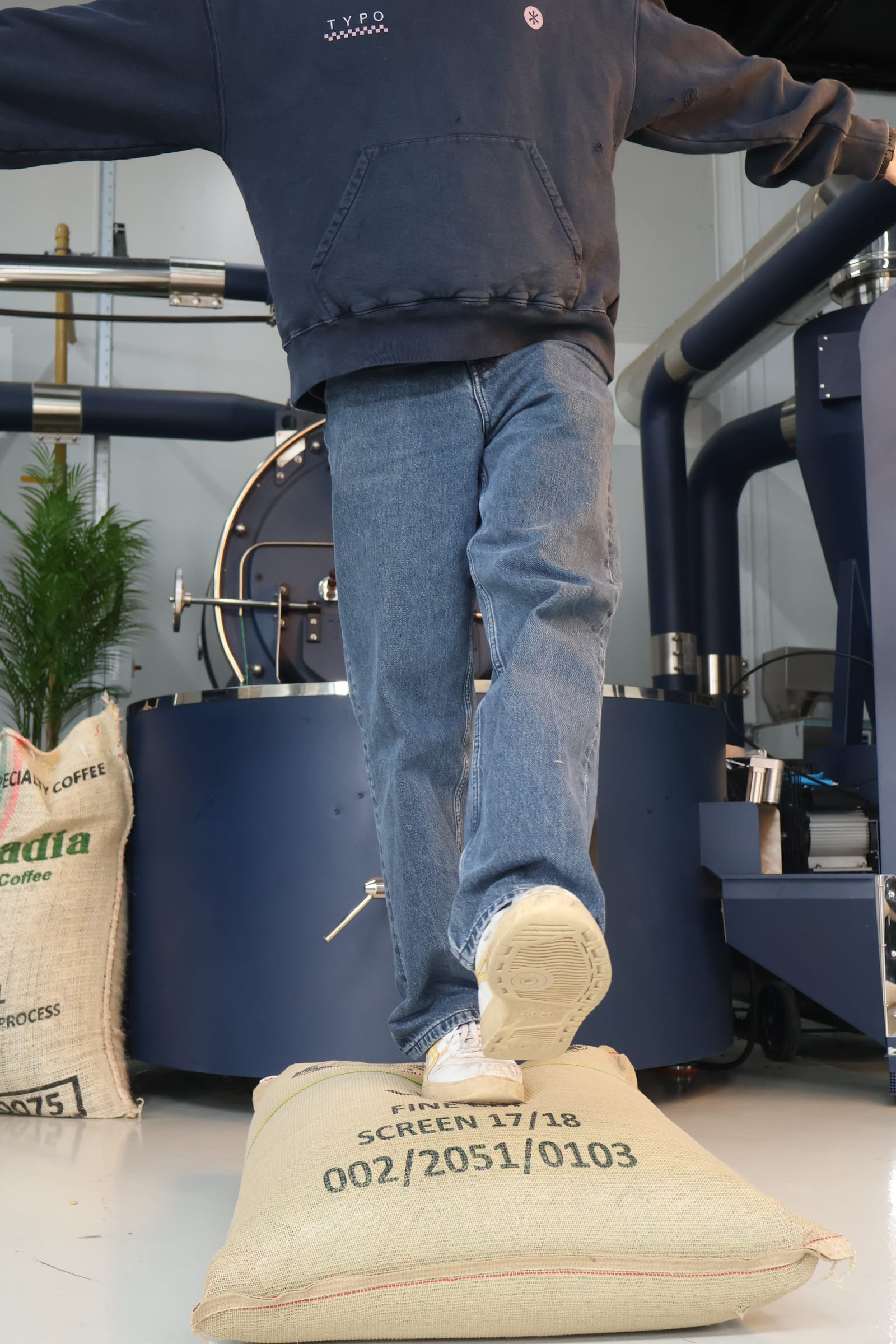 Typo Coffee roaster working beside the roaster in Mullingar